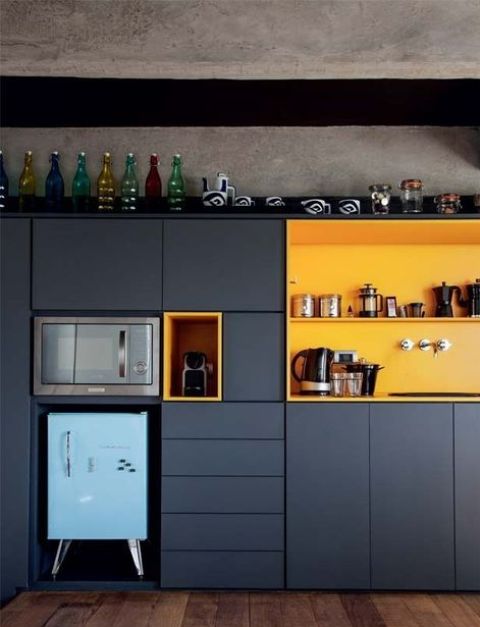 01-a-navy-kitchen-with-yellow-compartments